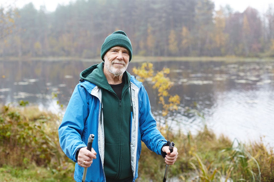 A gentleman enjoying a nature walk