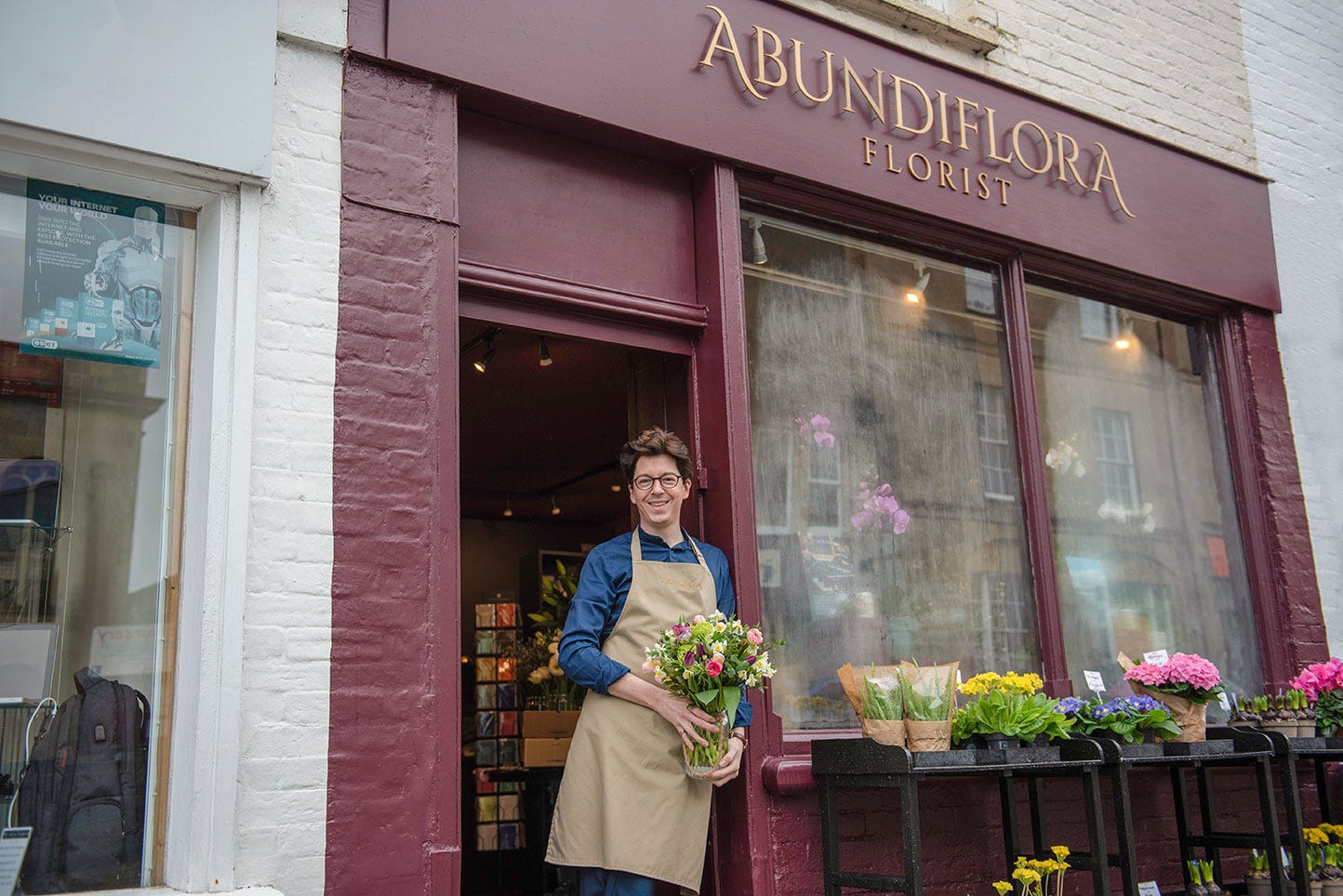 Jake outside his florist shop, Abundiflora